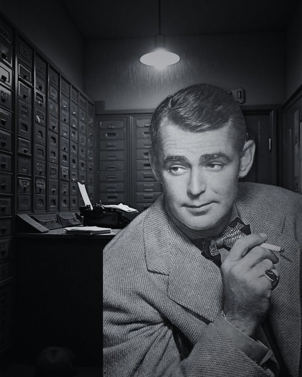 Alan Ladd in a newspaper office at night